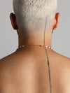 Beaded Necklace with long white beads and small blue lapis beads