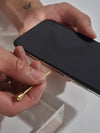 Gold Q Tip Earring as SIM card ejector